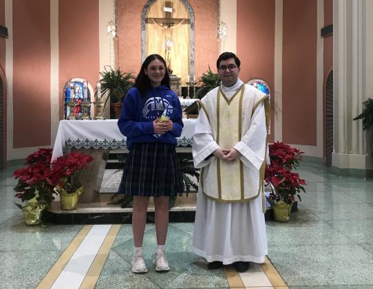 New ACT 22+ Club member Anna Fruge and the Rev. Sal Istre