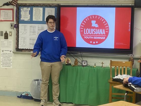 Joe Aucoin, a current junior at St. Edmund High, presented information about the Louisiana Youth Seminar to fellow classmates.
