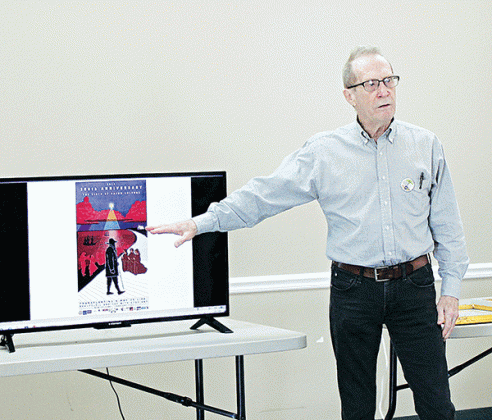 Warren Perrin, guest speaker for a recent meeting of the French Table of Rayne, explains The New Acadia Project, dedicated to the identification, investigation and preservation of the original home sites and final resting places of Acadians who began what is known today as Acadiana. (Photo by Lisa Soileaux/Rayne Acadian-Tribune)