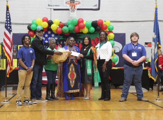 Members of the Eunice Branch NAUW visited Ville Platte High School during their Black History Program and presented several boxes of books by Black authors to their library and a financial donation to be used for purchasing more books.
