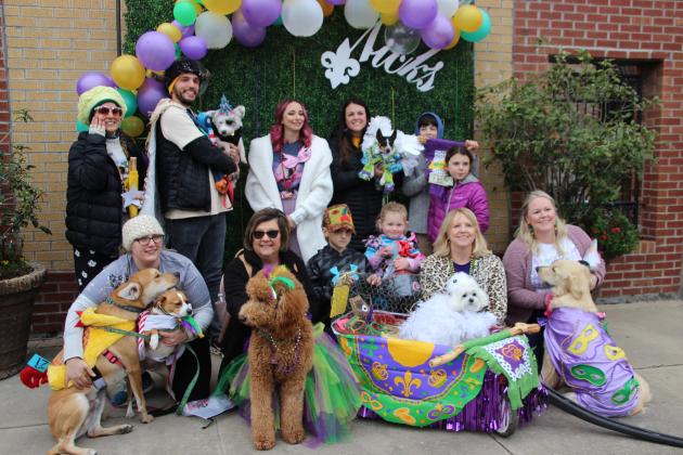 Who Let The Dogs Out?... A Parade of Paws was held Saturday afternoon on downtown S. 2nd. The event was the sixth annual one. First, second and third place winners were named and some canines captured winning ribbons. (Photo by Myra Miller)