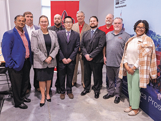 Front row, from left: Dr. Ramesh Kolluru, vice president of Research, Innovation, and Economic Development; Deidre Deculus Robert, director of state USDA Rural Development; Dr. Peng Solomon Yin, associate professor in Mechanical Engineering and principal investigator of the REAP grant; Chaston Price, coordinator of state USDA Rural Development Energy; Dr. Terry Chambers, director of the University’s EDA-funded Green Hydrogen Center of Excellence and its Energy Efficiency and Sustainable Energy Center and co