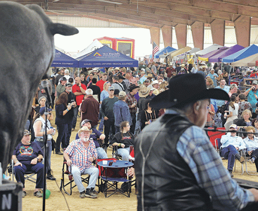 Some of the crowd is shown at the cook-off.