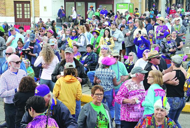 The streets of downtown Eunice were emptied by a storm packing tropical force winds Tuesday afternoon, but once the wicked weather passed the crowd reemerged to dance to the music of Steve Riley and The Mamou Playboys.