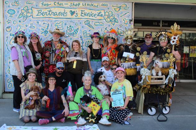 The ninth annual Parade of Paws was held Sunday afternoon at downtown North 2nd with over 29 entries of Mardi Gras clad canines. The organizer of the event is Jerica Guillory. Pictured above are first, second, and third place winners and ribbon winners.  (Photos by Myra Miller)
