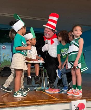 Eddie Thibodeaux of the St. Landry Parish Sheriff representing the Cat in the Hat, Journee Sampe, Zo’Mauri Paddio, K.J. Wilson, Harlee Thomas and A’Mani White.