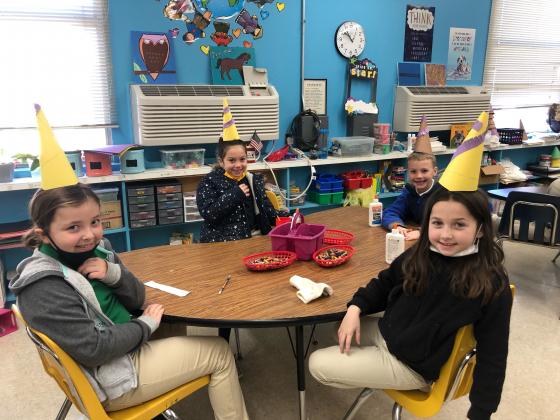 At right, from left, are Aubrey Miller, Bella Lomas, Blake Carrier and Lillian Oliver.