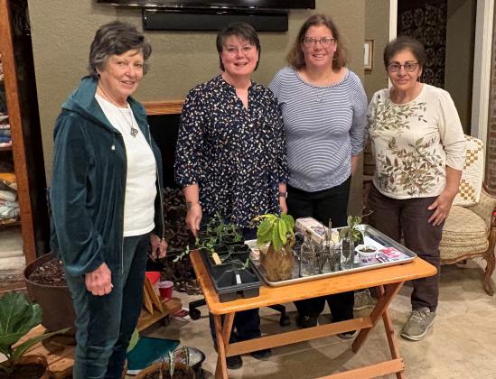 Bulb &amp; Blossom Garden Club members celebrate March birthdays during the club’s March meeting. From left are Lynn Pavich, Mona Redlich, April DeRouen and Donna Baltakis, club president. (Photo by Celeste Gomez)
