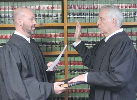 Ville Platte City Judge Greg Vidrine gives the oath of office to newly elected Appellate Judge Gary Ortego of Ville Platte. (Photo by Tony Marks/Ville Platte Gazette)