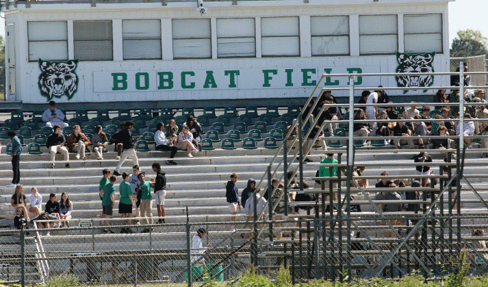 Eunice first-responders were dispatched to Eunice High School Wednesday morning in response to a bomb threat. Roads to the school were blocked. Students are shown in the football stadium as the threat is investigated. (Photo by Harlan Kirgan)