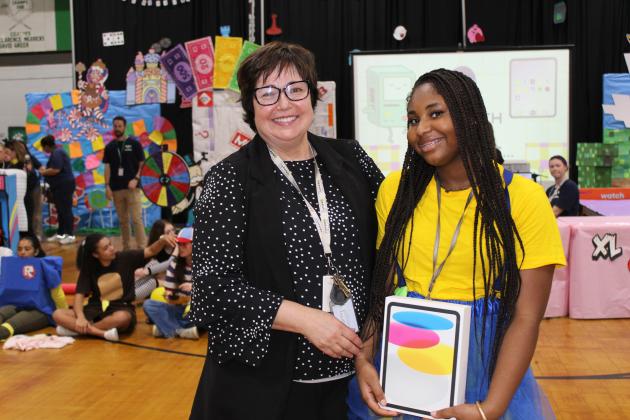 The grand prize winner from the grand drawing was Aniya Strauss, a freshman. Strauss is pictured with Eunice High Principal Irma Trosclair. She won an Apple iPad.