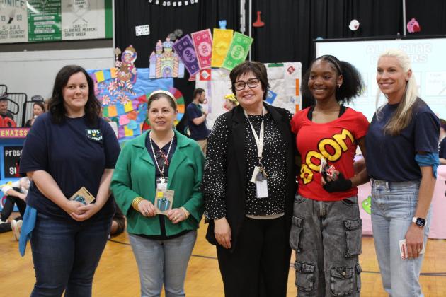 Eunice High School honored its top students and faculty during the Renaissance Pep Rally held Friday. From left are Kaitlin Manuel, Teacher of the Year; Jamie Smith, Support Person of the Year; Principal Irma Trosclair; Fajah Guillory, Student of the Year; and Jeanne Elfert, New Teacher of the Year.