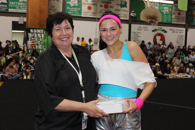 Irma Trosclair, principal at Eunice High School, is with the grand prize winner Jacelyn Faul, a junior. A drawing of all student’s names was held at the conclusion of the pep rally and Faul won an Apple iPad and an Apple Pencil.