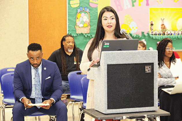 St. Landry Parish School Board member Tiffany Nolan proposes a new school violence policy at a committee meeting. Also shown, seated, from left, are Courtney Joiner, Board attorney; Rod Sias, parish NAACP president; and Shaun Grantham, finance director. (Photo by Harlan Kirgan)