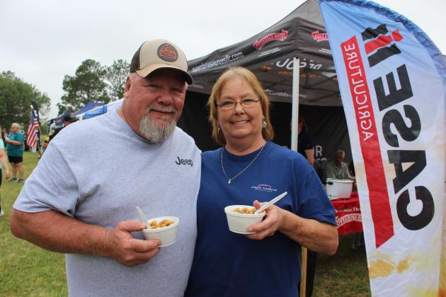 Kenneth and Suzanne Manuel of Mamou ate crawfish etouffee from Progressive Tractor’s cooking booth.