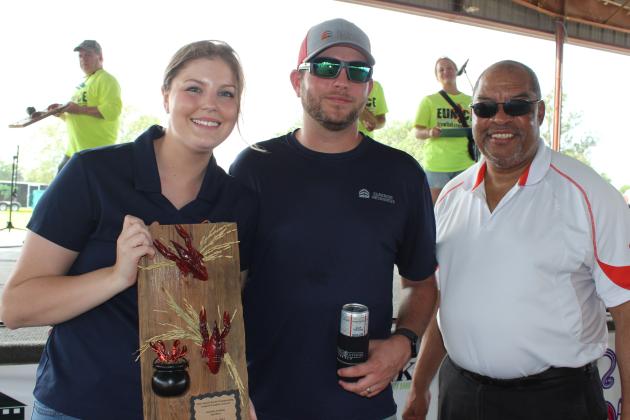 Superior Resources won third place in the Cooking Amateur division. From left are Megan Mitchell, Brady Mitchell and Nathaniel Allen, one of the judges.