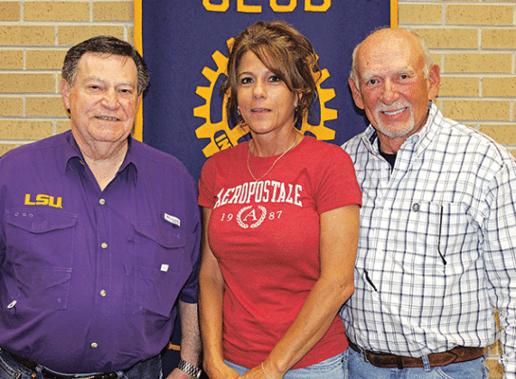 Dr.  Ned Fruge was the guest of Rotarian Leah Harris Wednesday at the Eunice Rotary Club meeting. From left are Rotary Club President Ellis Daigle, Leah Harris and Fruge. (Photo by Myra Miller)