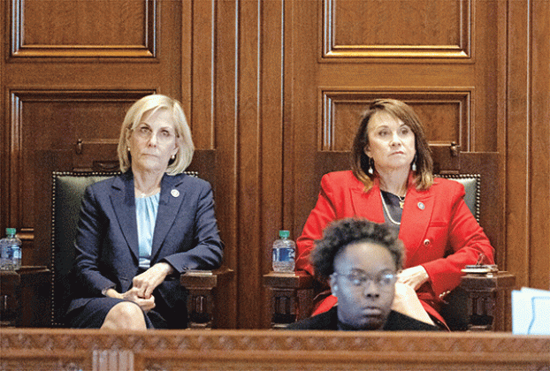 Louisiana Secretary of State Nancy Landry, left, sits with Louisiana Attorney General Liz Murrill as Gov. Jeff Landry speaks on opening day of a legislative special session focusing on crime, Feb. 19, at the State Capitol in Baton Rouge. (Hillary Schienuk/ The Advocate, Pool)