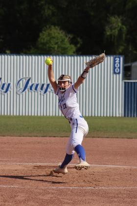 St. Edmund defeated Lake Arthur in 5 innings Monday, March 30 with a score of 16-2. Pictured is Brianna Lopez pitching for the team. (Photo by Amy Myers)