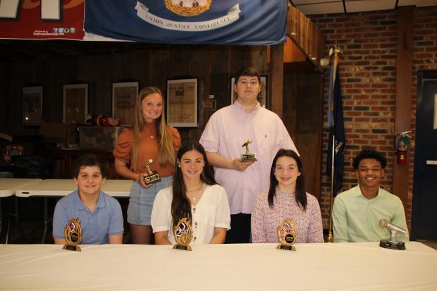 Students who participated and placed in an Americanism essay contest, sponsored by the VFW Post 8971 and Auxiliary were recognized. Seated, from left, are Davis Manuel, Aubrie LeJeune, Caroline Fontenot and Jessie Gathe. In back, from left, are Abbie Dupre and Eric Veillon. Not pictured is the Teacher of the Year at Eunice High, Misty Guillory.