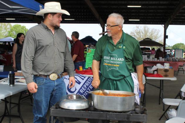 Discussing crawfish? Randy Guidry, left, and Barry Soileau were at the cooking booth of St. Landry Parish Government.