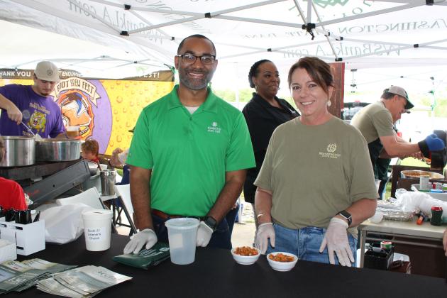Ready to serve the public Saturday were Juwan Durgan, left, and Angie Guillory with Washington State Bank.