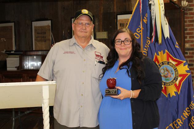 VFW Post 8971 and Ladies Auxiliary sponsor Americanism essay contests each year. Winners were named, and the Teacher of the Year was honored and recognized. Donnie Fontenot, post quartermaster, presents an award to Samantha Ortego, Eunice Jr. High Teacher of the Year. (Photo by Myra Miller)
