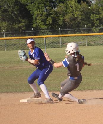 The St. Edmund Lady Jays traveled to Crowley Tuesday to take on the Northside Christian Warriors. The Jays came home the victor with a 7-4 win. Pictured is Rory Langlinais making an out at 2nd base and looking for a double play a first. (Photo by Amy Myers)