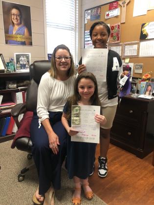 East Elementary awarded ‘Positive Office Referrals’ to Kenzlea Peres and Raylyn Janice. They are with Principal Gina LaGrange.