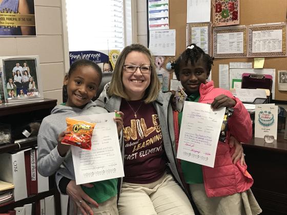 East Elementary named its ‘Positive Officer Referrals.’ From left, are Elissa Orbeaux, Gina LaGrange, prinicipal; and Cyrione Lewis.