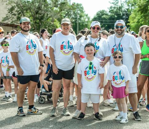 The Belly Buddies Color Fun Run was held Saturday morning with nearly 500 entries to run, walk, stroll, all for a worthy benefit of feeding school children that are in need. From left are Austin Stanford, Tammy Stanford, Katie Richard, and Brad Richard. Directly in front are Reid Richard and Molly Fontenot.