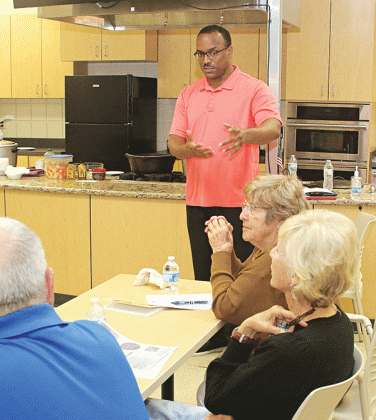 Herman Fuselier, St. Landry Parish Tourism Commission executive director, speaks at a Thursday’s meeting.