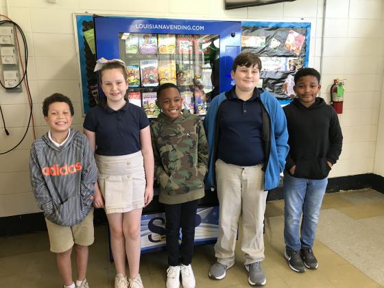 Jayden Archangel, left, Ella Boone, Treal Dupre,  Michael Mooney and Jaylen Moore received an award during East Elementary’s recent LEAP Pep Rally.