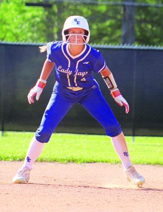Sloane Cart attempting to steal to third base in St. Edmund’s victory over Slaughter Community Charter School on April 17. (Photo by Amy Myers)