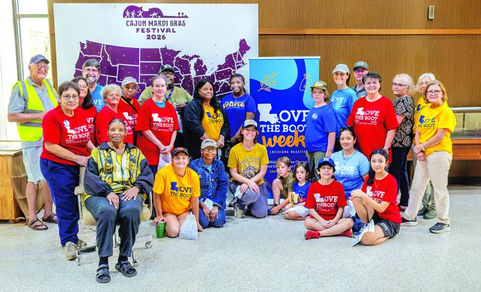 Love The Boot Clean Up Day Organizer Donna Baltakis (far left) stands with her many volunteers in Eunice last Saturday. (Submitted photo)