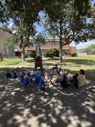 St. Edmund Elementary’s Pre-K students spent some time exploring and learning about the beautiful statues around the church and school grounds.