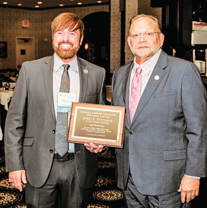 Acadia Parish Assessor James J. “Jimbo” Petitjean, right, was named the “2023 Assessor of the Year” at the90th annual Assessor’s Conference held recently in Bossier City. Presenting the award was Louisiana Assessor’s Association Immediate Past President Lance Futch. (Submitted photo)