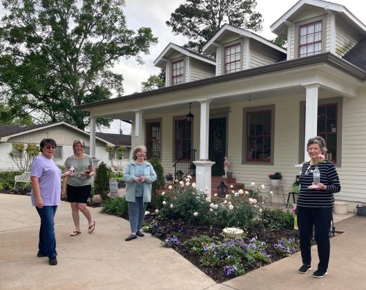 A tour of rose gardens at Kathy Manuel’s home, a member of the Bulb &amp; Blossom Garden Club was part of the members April meeting. From left are Mona Redlich, Jean Johnson, Kathy Manuel, hostess; and Lynn Pavich. (Submitted photo)