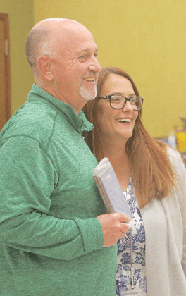 Eunice High School head baseball coach Terance “Scott” Phillips was honored on retirement after 32 years as an educator. With Phillips is his wife, Lauri, at the May 1 St. Landry Parish School Board meeting.