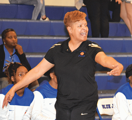 North Central coach Vanessa Taylor gives instruction to her team against St. Edmund during the 2022-23 basketball season. (Photo by Tom Dodge)