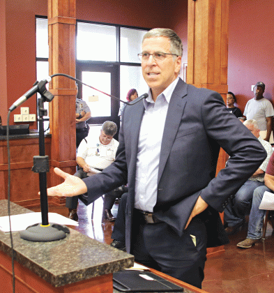 Steve Moosa, CPA, of Darnall, Sikes & Frederick, delivers a report on adjudicated property sales at the St. Landry Parish Council meeting on May 3. (Photo by Harlan Kirgan)