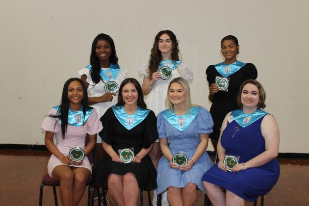 Senior ACE Lettermen were honored during the high school’s Academic Excellence Program Wednesday morning. From left, are Madlyn Edwards, Olivia Pedigo, Kathryn Quebedeaux and Carly Higginbotham. In back, from left, are Alivia Cesar, Kyra Davis and Brilye Reed.