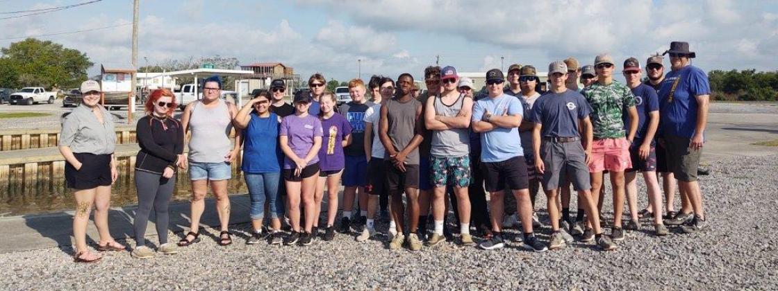 Eunice, Erath, Kaplan FFA chapters, along with other volunteers are ready in the water planting of grass at the Vermillion Bay near Intercoastal Canal for a Re-vegetative project. (Submitted photos)