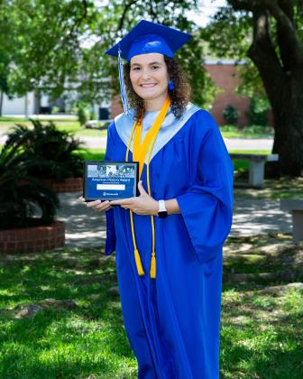 Receiving the Woodman of the World History Award and the Distinquished Service Award was Julia Zaunbrecher.
