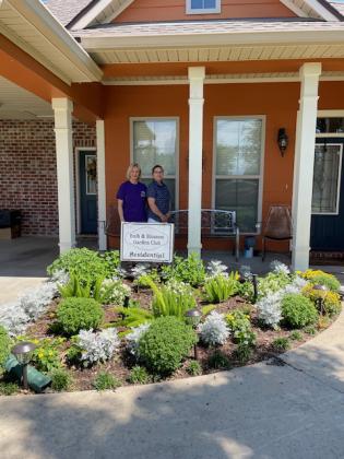 Noonie Zaunbrecher was awarded Residential Yard of the Month for May by the Bulb &amp; Blossom Garden Club. Her home, located on Hazel Street, has a yellow, orange and white theme featuring Knockout roses, mums, dahlias, hydrangeas, daisies as well as foxtail ferns and potato vines. From left, are Noonie Zaunbrecher and her daughter D’Lisa Zaunbrecher.