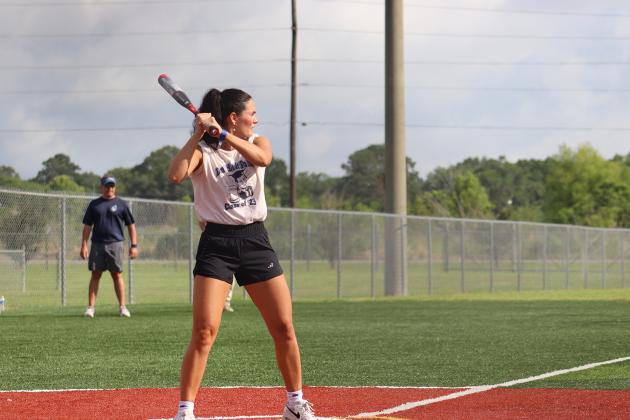 Mary Helen Miller, class of 2023, goes up for bat.