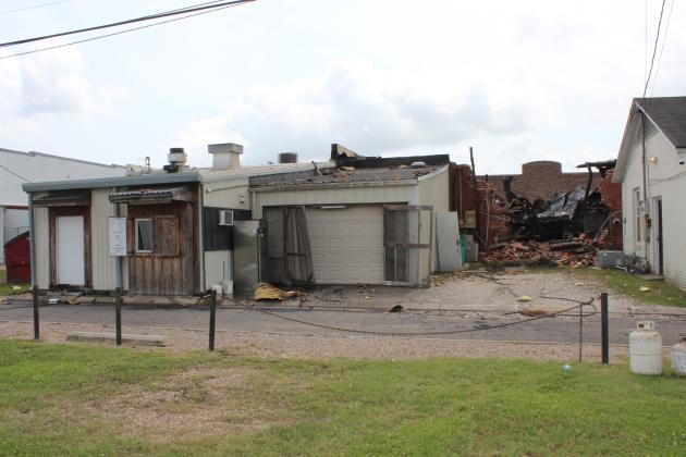 Back of Nick's on 2nd at alley.