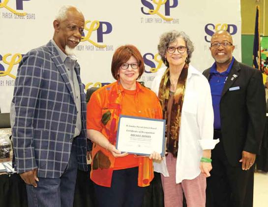 The St. Landry Parish School Board recognized retirees at its Thursday meeting. From left, are Albert Hayes Jr, Board presidnet; Brenda Ardoin, retired from Eunice High as a teacher with 34 years of service; Mary Ellen Donatto, Board member; and Patrick Jenkins, school superintendent. Eighteen retirees were recognized. (Photos by Harlan Kirgan)