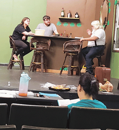 From left, are Becca LaFleur as Abby, Josh Faulkner as Jamie, and Brett Faulkner as Man rehearse a scene from ‘Now and Then’ at the Eunice Players’ Theatre. (Submitted photo)