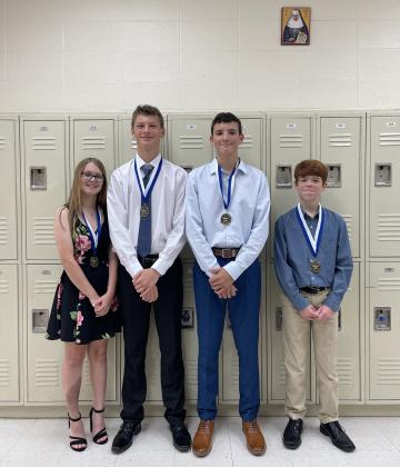 Receiving the Claire Francois Montz Awards at St. Edmund were, from left, Katie Miller, English; Dane Fontenot, science; Nathan Zaunbrecher, math; and Oscar Summerlin, religion.